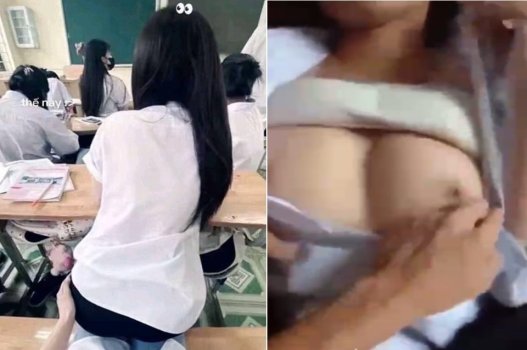 Nữ sinh khoe vú khi bị bạn vạch áo